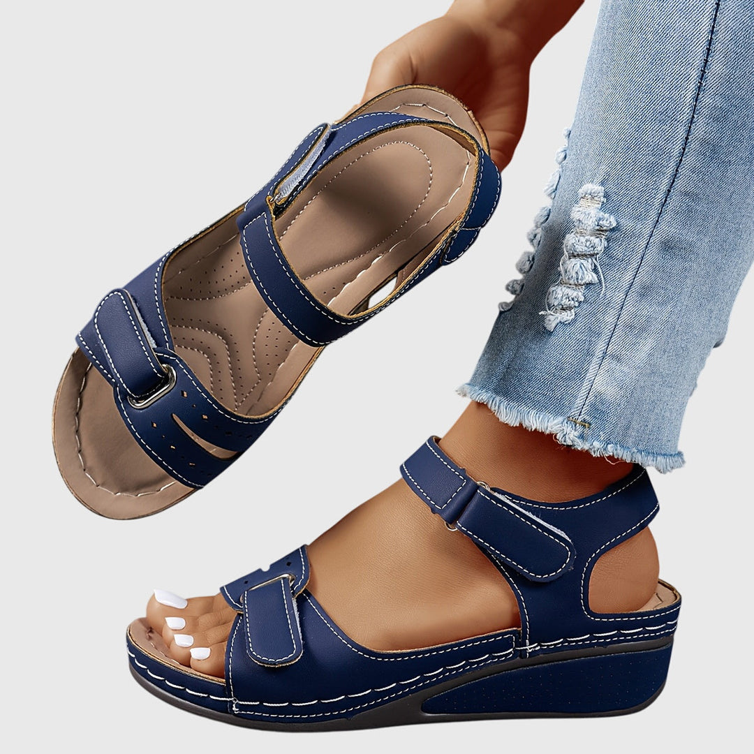 Orthopedic women's walking sandals, platform style with an adjustable buckle.