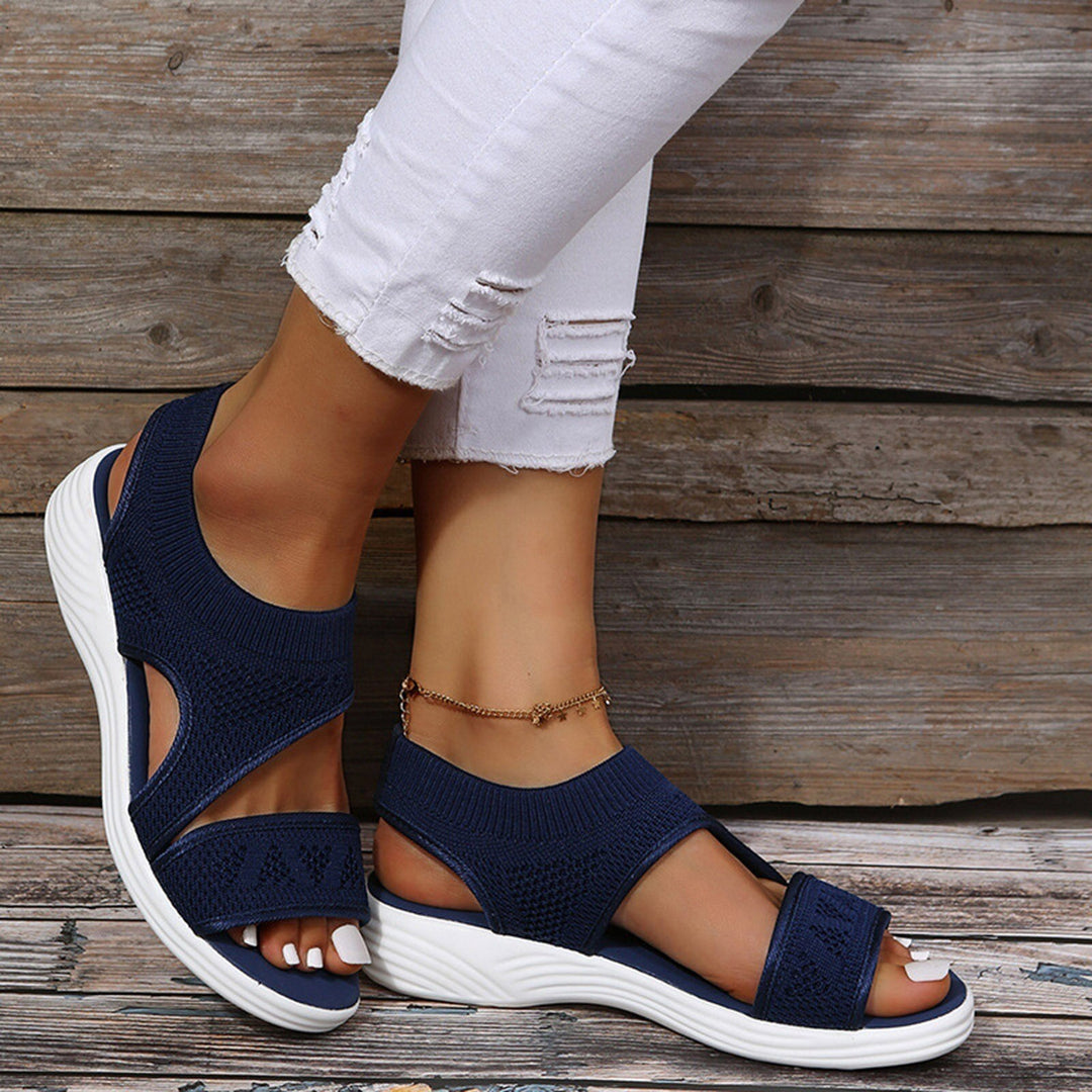 Stylish women's wedge sandals with orthopedic comfort, open toe, and arch support, perfect for walking.