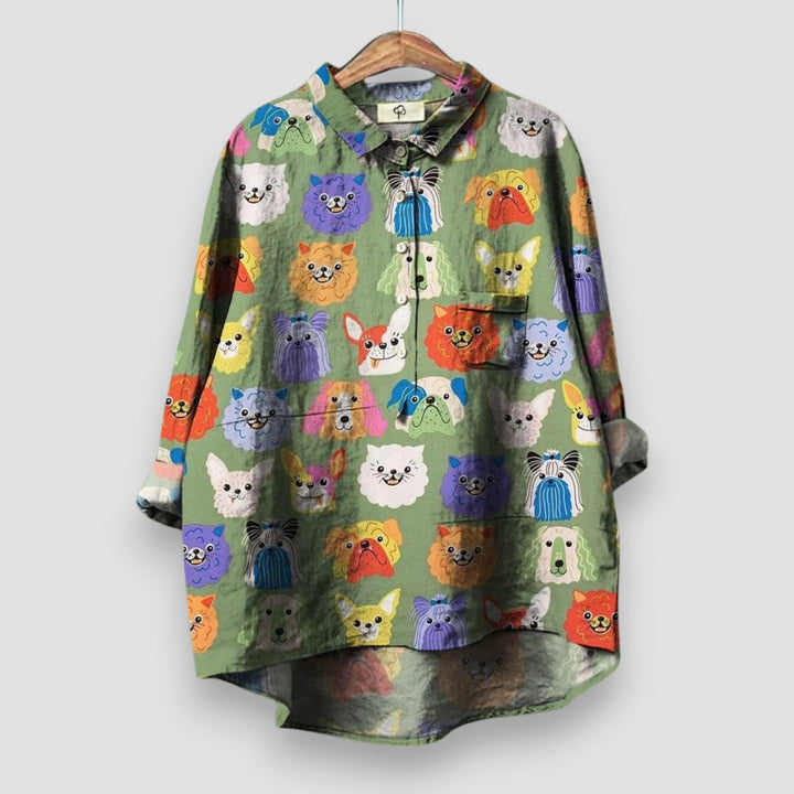 Comfortable women's casual shirt with a fun dog print. Short sleeve top, ideal for a playful and relaxed summer look.