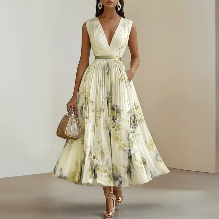 Stylish women's sleeveless pleated maxi dress in a vibrant summer color, great for beach, casual or elegant.