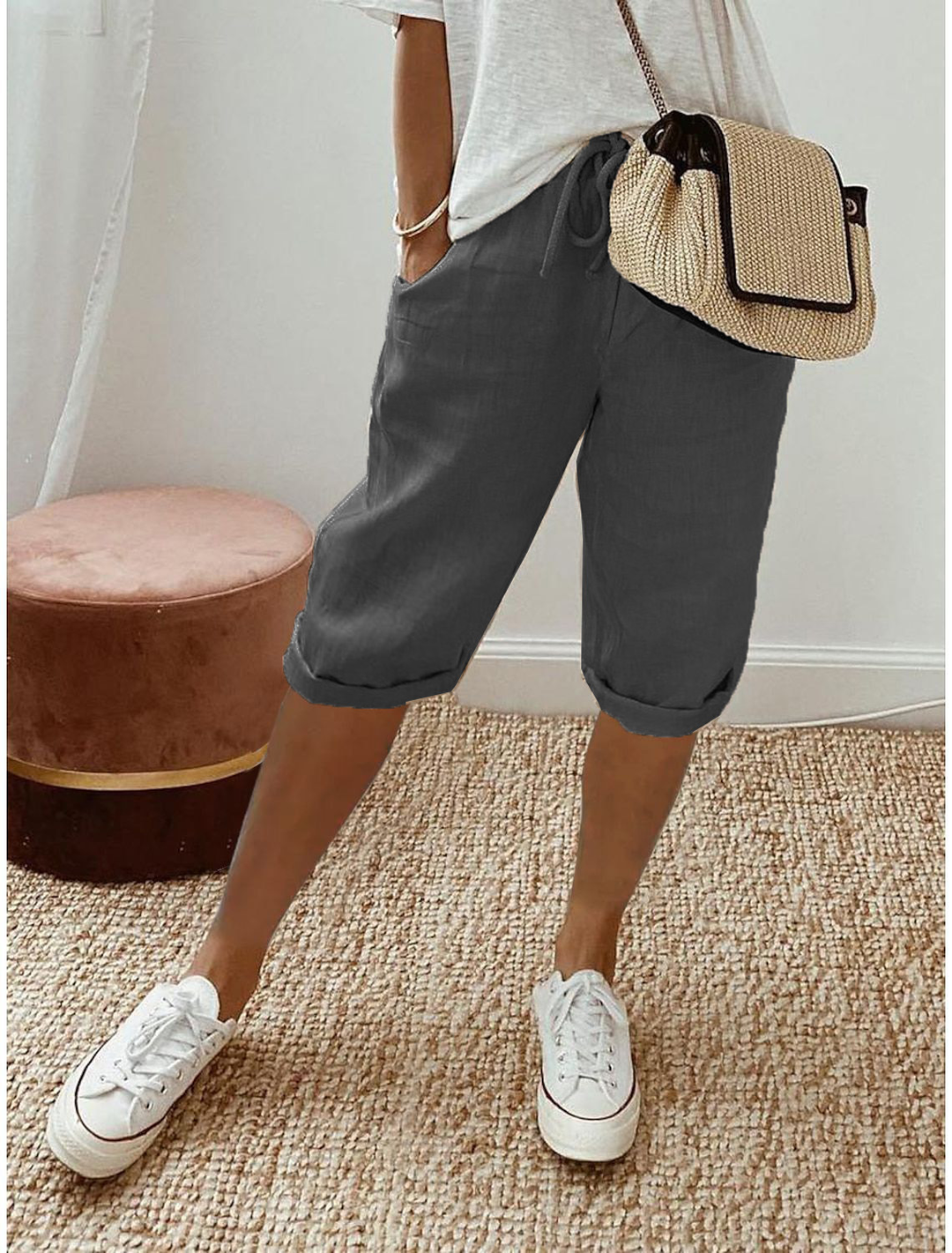 Lightweight women's pull-on capri pants, relaxed fit, elastic waist, ideal for summer comfort.
