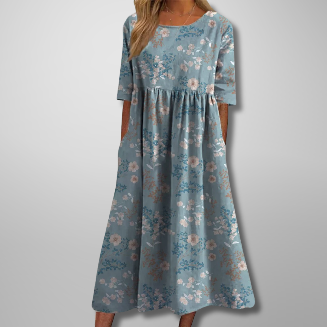 Soft, comfortable women's relaxed floral midi dress, perfect for warm weather and style.