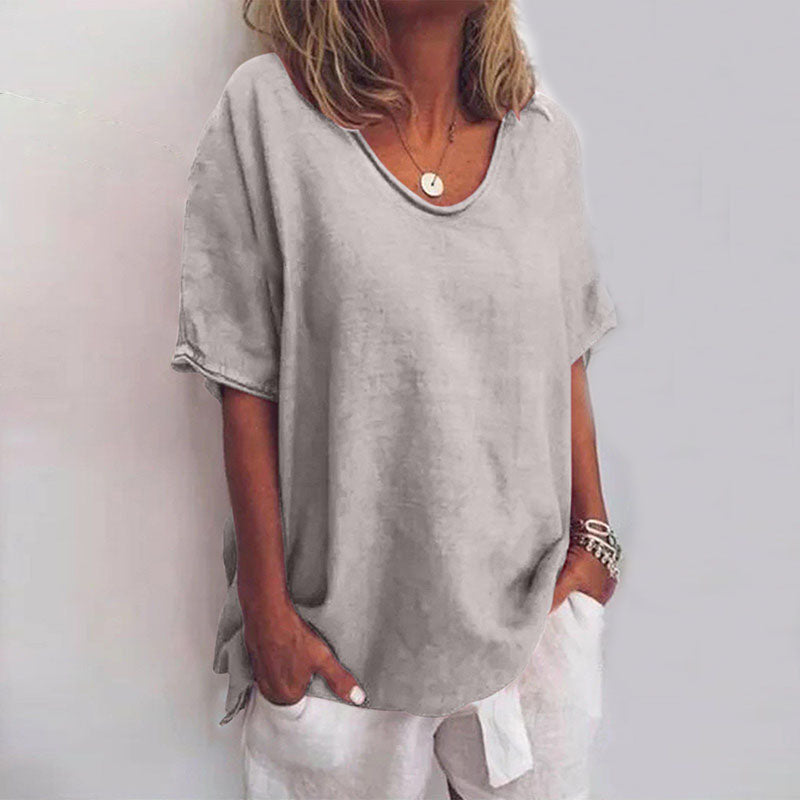Comfortable women's short sleeve blouse, featuring a stylish scoop neck and relaxed loose fit.