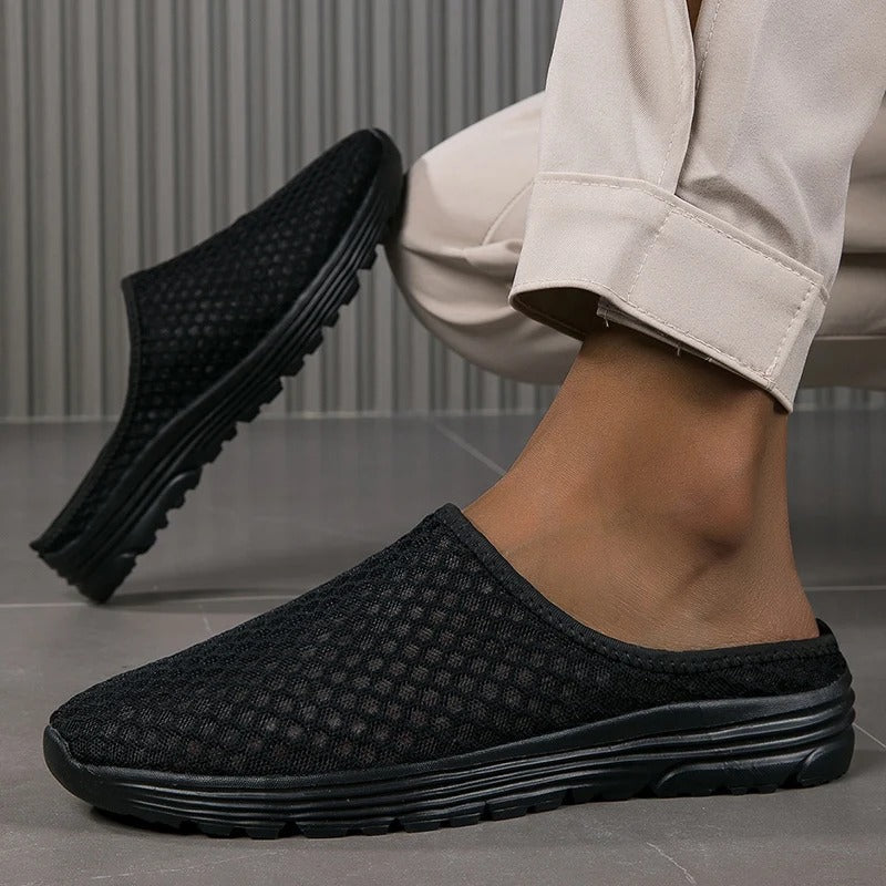 Side view of women's sleek slip-on orthopedic sneakers, showcasing strong arch support & cushioned sole.