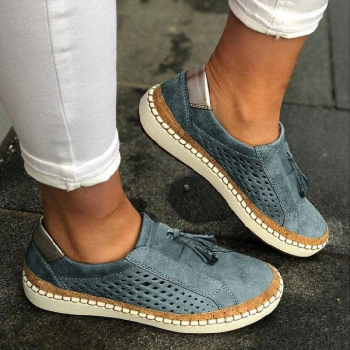 Breathable women's slip-on walking shoes with orthopedic arch support, ideal for summer travel & comfortable everyday wear.