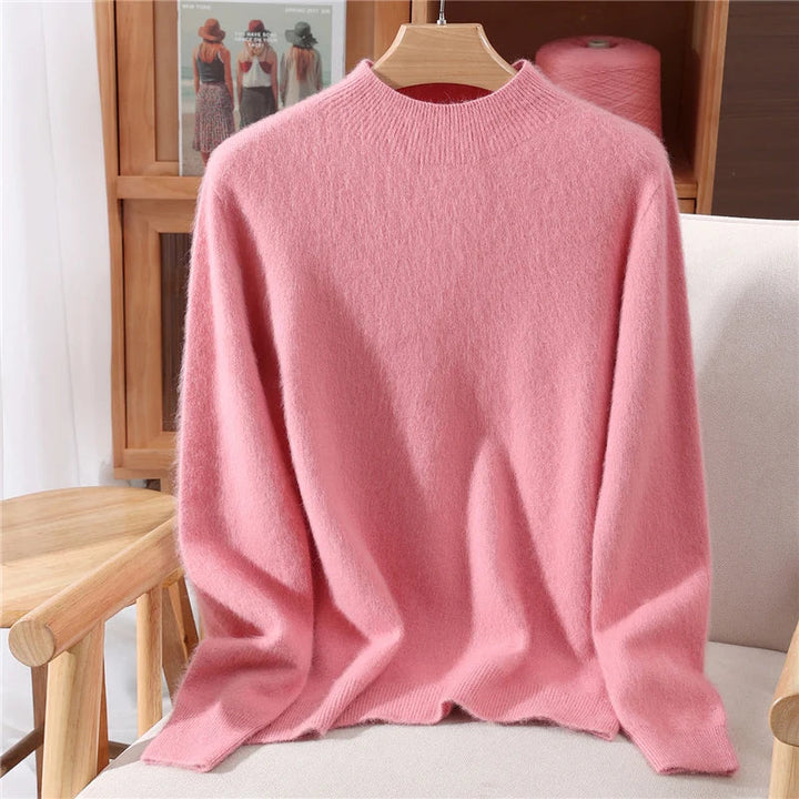 Elegant women's soft cashmere knit mockneck sweater, perfect for chilly fall and winter days.