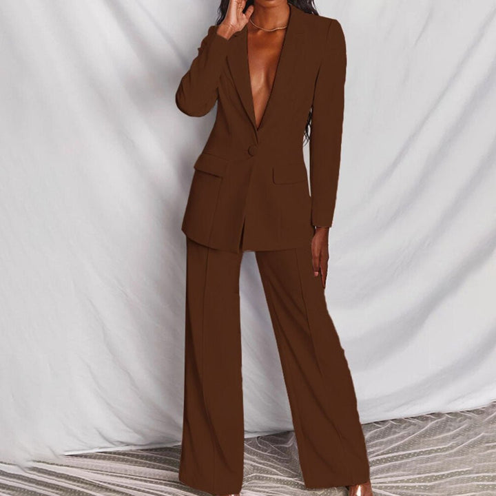 Women's business wear suit set. Tailored blazer & formal trousers.