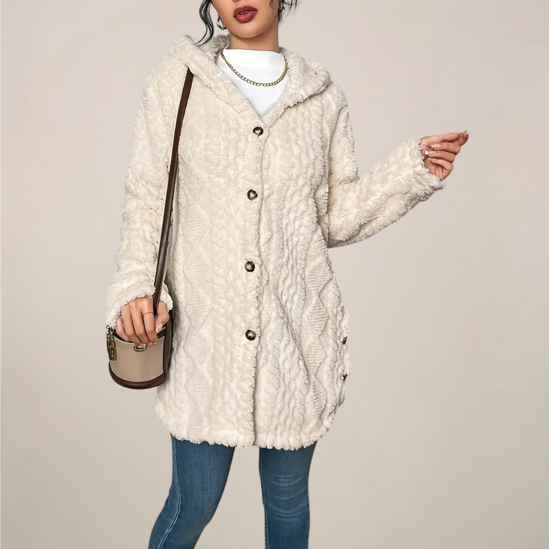 Casual women's longline hooded cardigan in a soft knit, ideal for layering outerwear