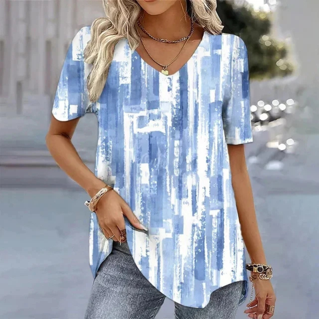Ladies' short sleeve V-neck t-shirt featuring a unique print. Relaxed fit top ideal for summer fashion & comfort.