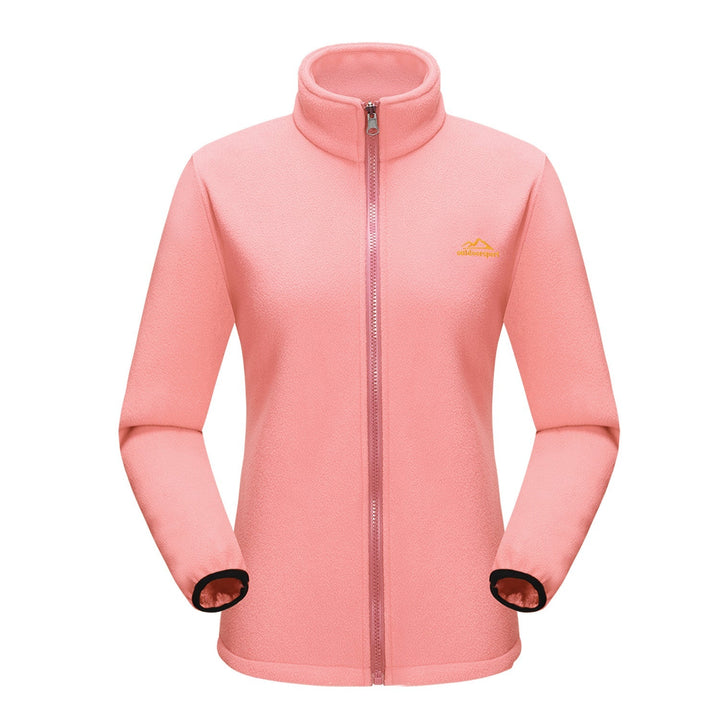 Woman adjusting the hood of her Verona 3-in-1 waterproof jacket, indicating adjustable features.