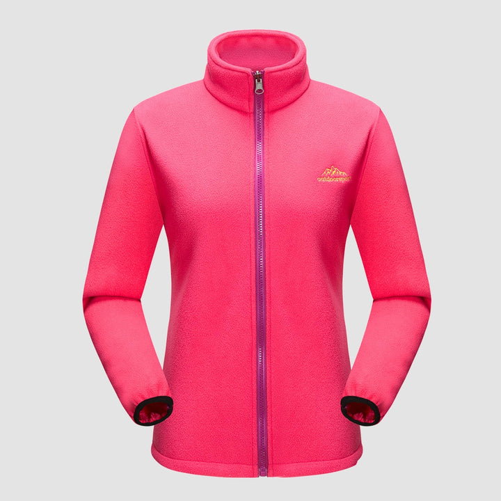 Stylish woman in a Verona 3-in-1 waterproof jacket, looking confident and protected from the elements.