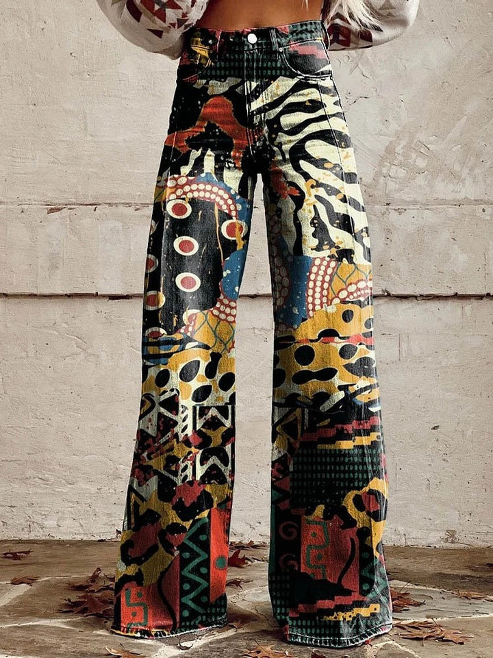 Full shot of women's wide-leg flare jeans in vintage floral print, perfect for a retro boho look.
