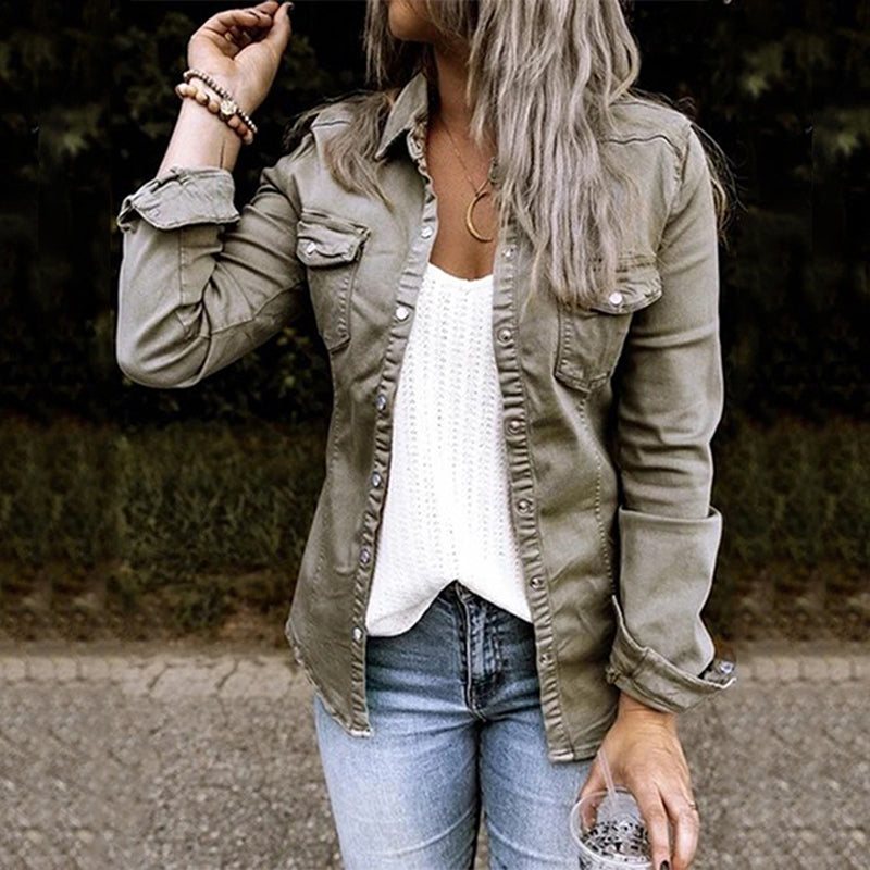 Women's lightweight denim shirt jacket with button front, structured silhouette, and chest pockets for a casual chic look.