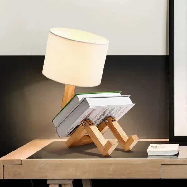 Adjustable wooden robot table lamp for desk or reading. Modern and unique home decor.